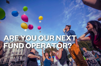 People celebrating with balloons in the air, with text on it saying '"are you our next fund operator?".