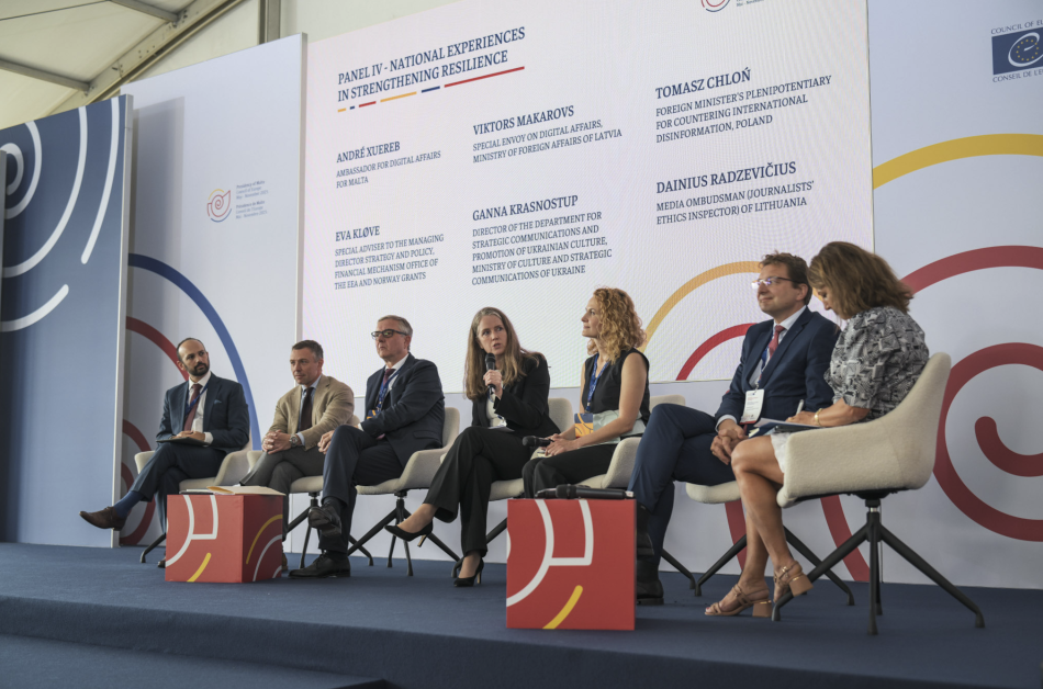 Panel debate on stage